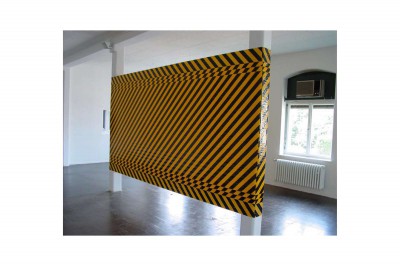 Tape around two pillars